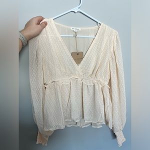 NWT woman’s blouse. Long sleeve
